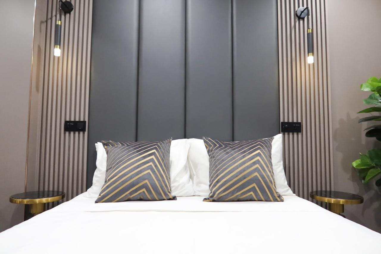 Recharge Studio Apartment & Suites Сингапур Стая снимка