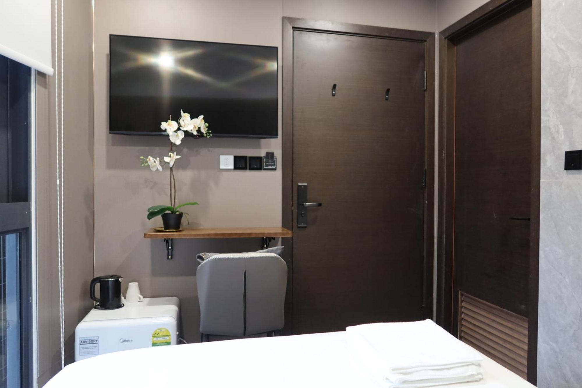 Recharge Studio Apartment & Suites Сингапур Стая снимка