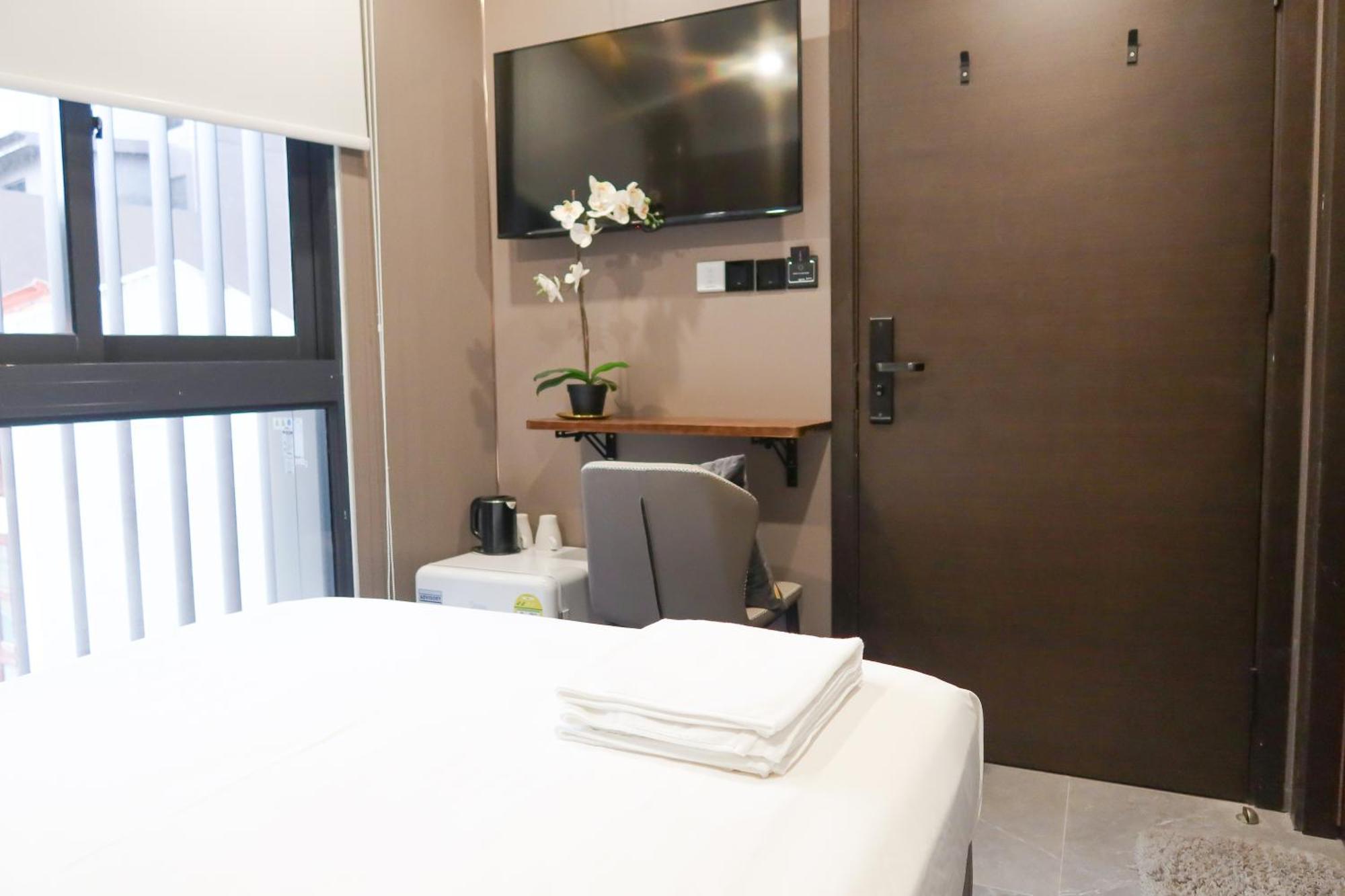 Recharge Studio Apartment & Suites Сингапур Стая снимка